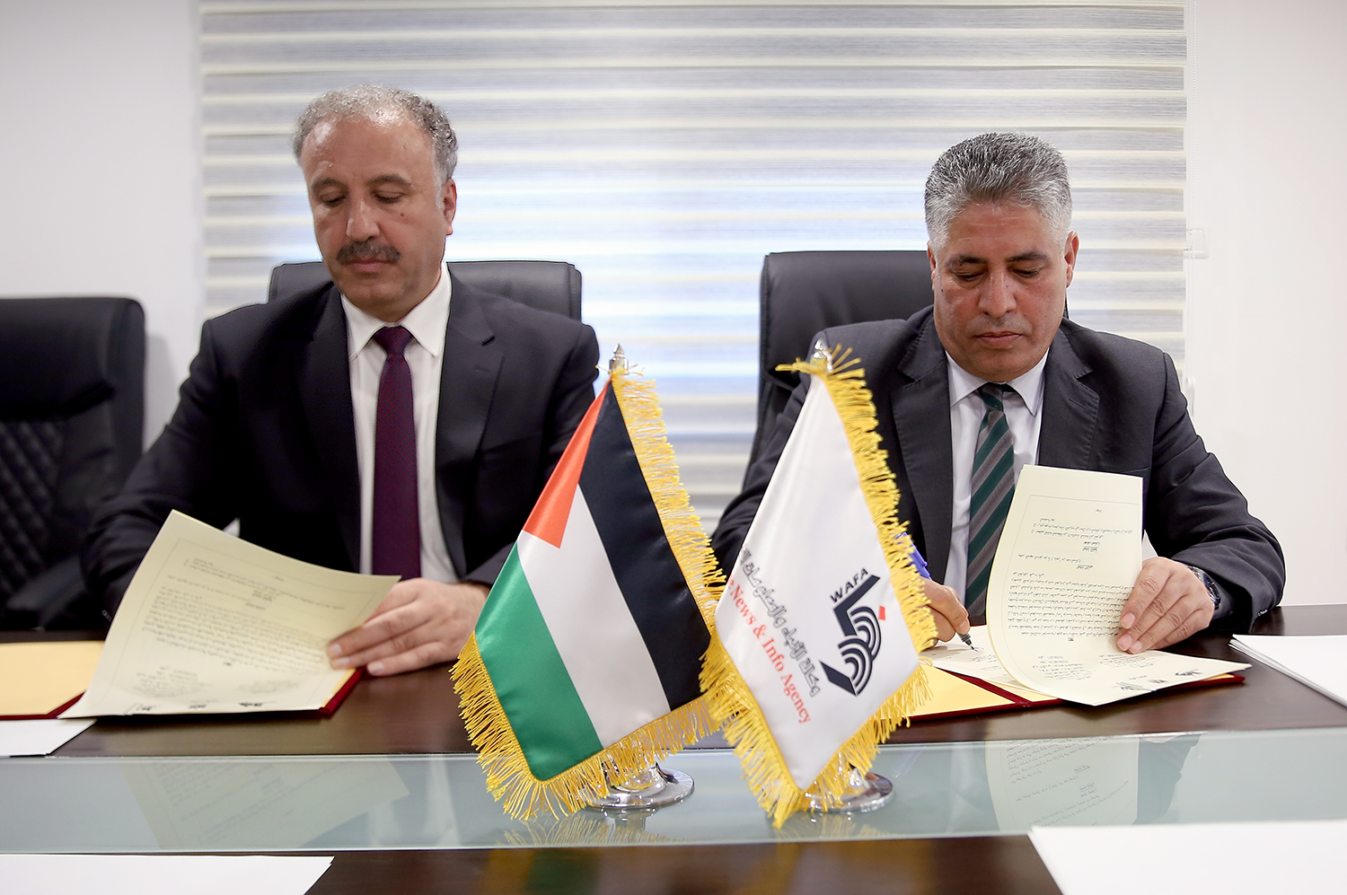 جانب من توقيع الاتفاقية