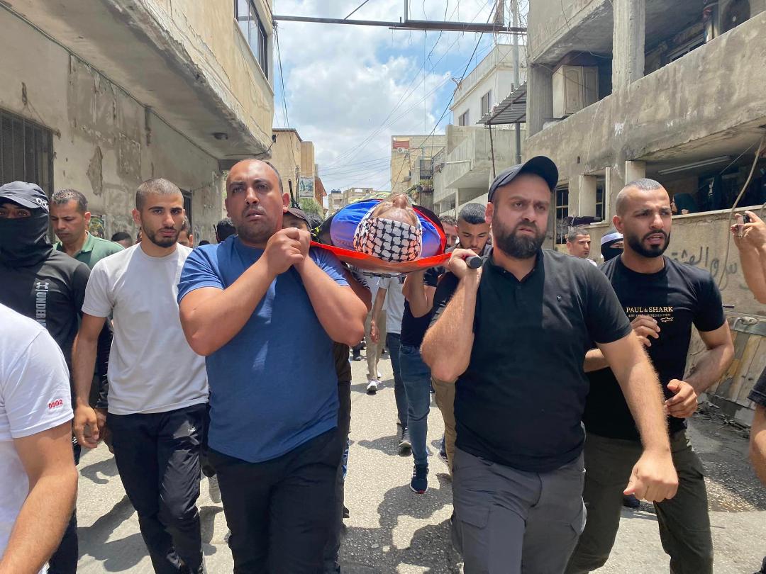 جانب من تشييع جثمان الشهيد أمجد عارف الجعص في مخيم جنين (عدسة: ثائر أبو بكر/ وفا)