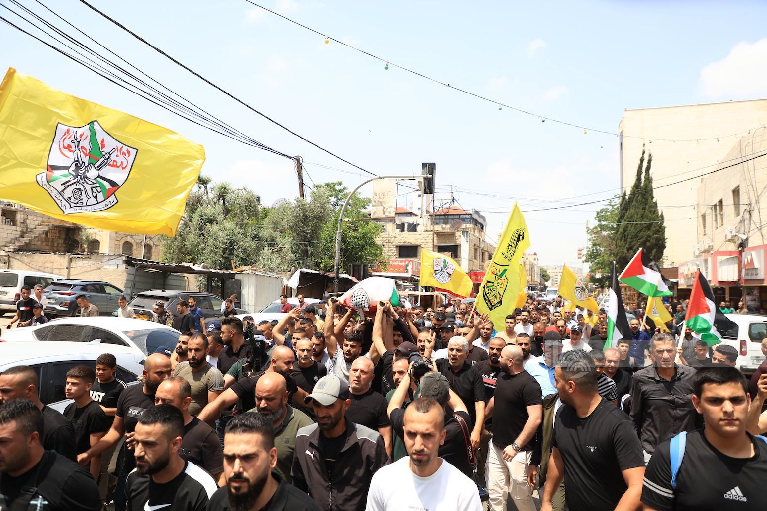 جانب من تشييع جثمان الشهيد أشرف إبراهيم في جنين (تصوير: عدي دعيبس/ وفا)