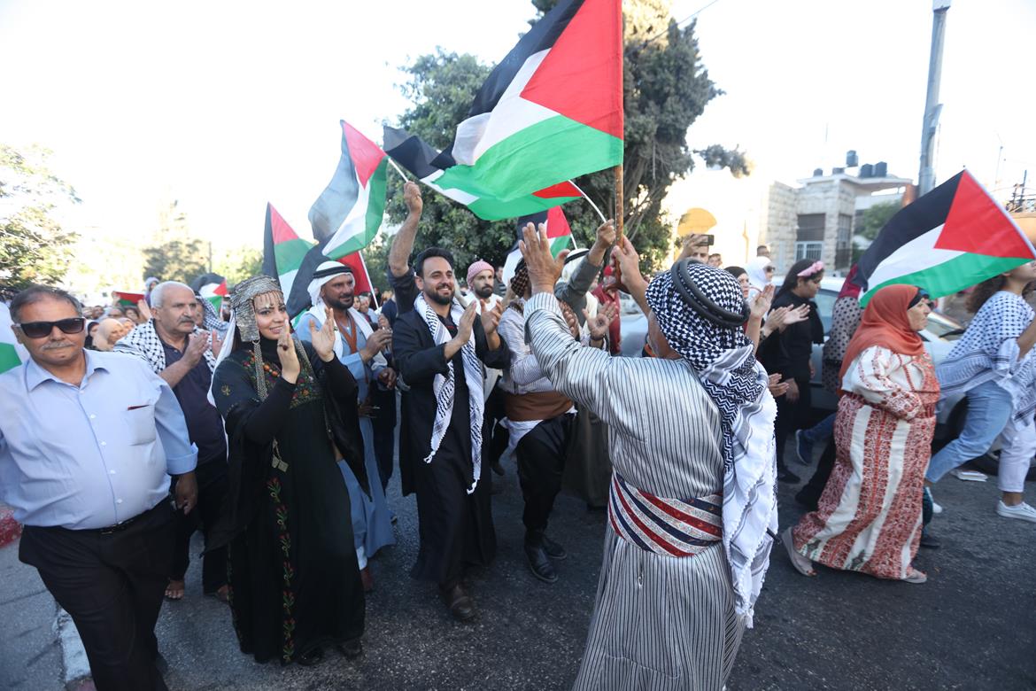 جانب من انطلاق فعاليات يوم الزي الفلسطيني (تصوير وفا)